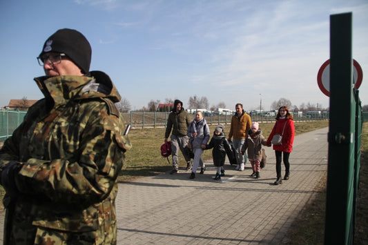 ‘It was hell’: Long lines of Ukrainian refugees at Poland border